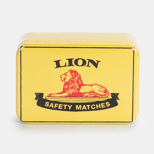 Yellow box of Lion safety matches on a white background