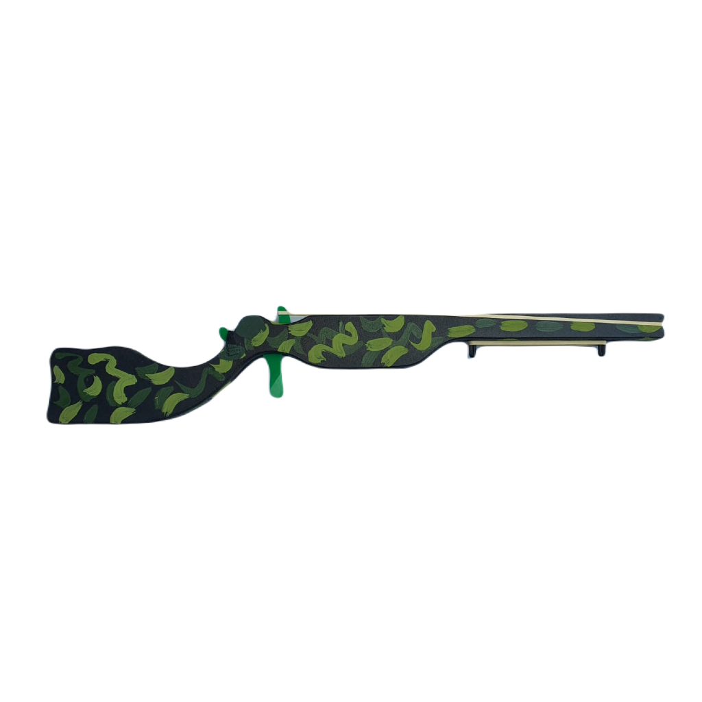 A toy gun with a camouflage pattern.