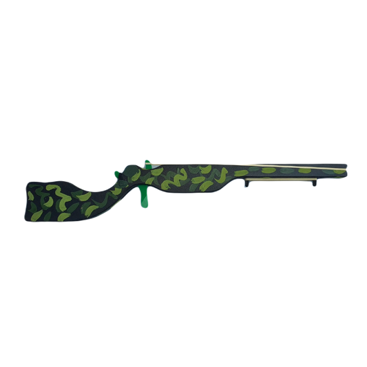A toy gun with a camouflage pattern.