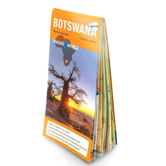 A folded paper map of Botswana with the Tracks4Africa branding, featuring an image of a sunset and a baobab tree on the cover.