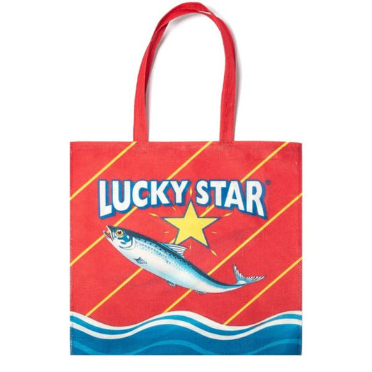 A red shopping bag with a Lucky Star sardine print, featuring a yellow star and blue wave pattern.