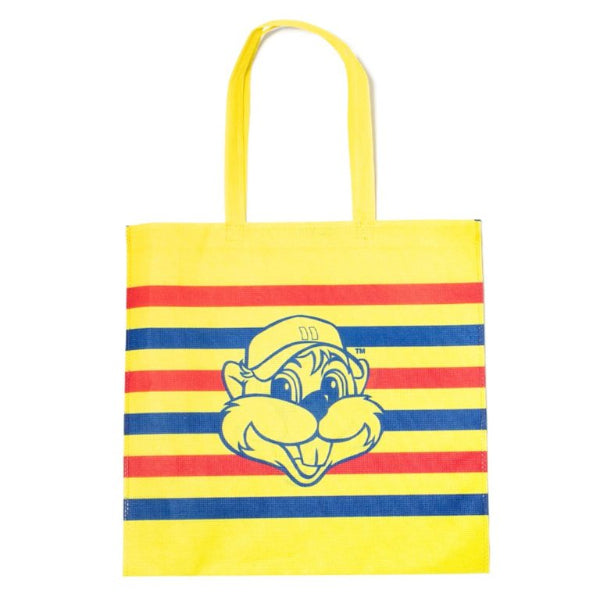 A yellow shopping bag with red and blue stripes and an illustration of a character on it.