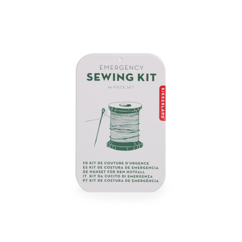 Packaging of an emergency sewing kit containing a list of included sewing tools and a visual of a spool of thread.